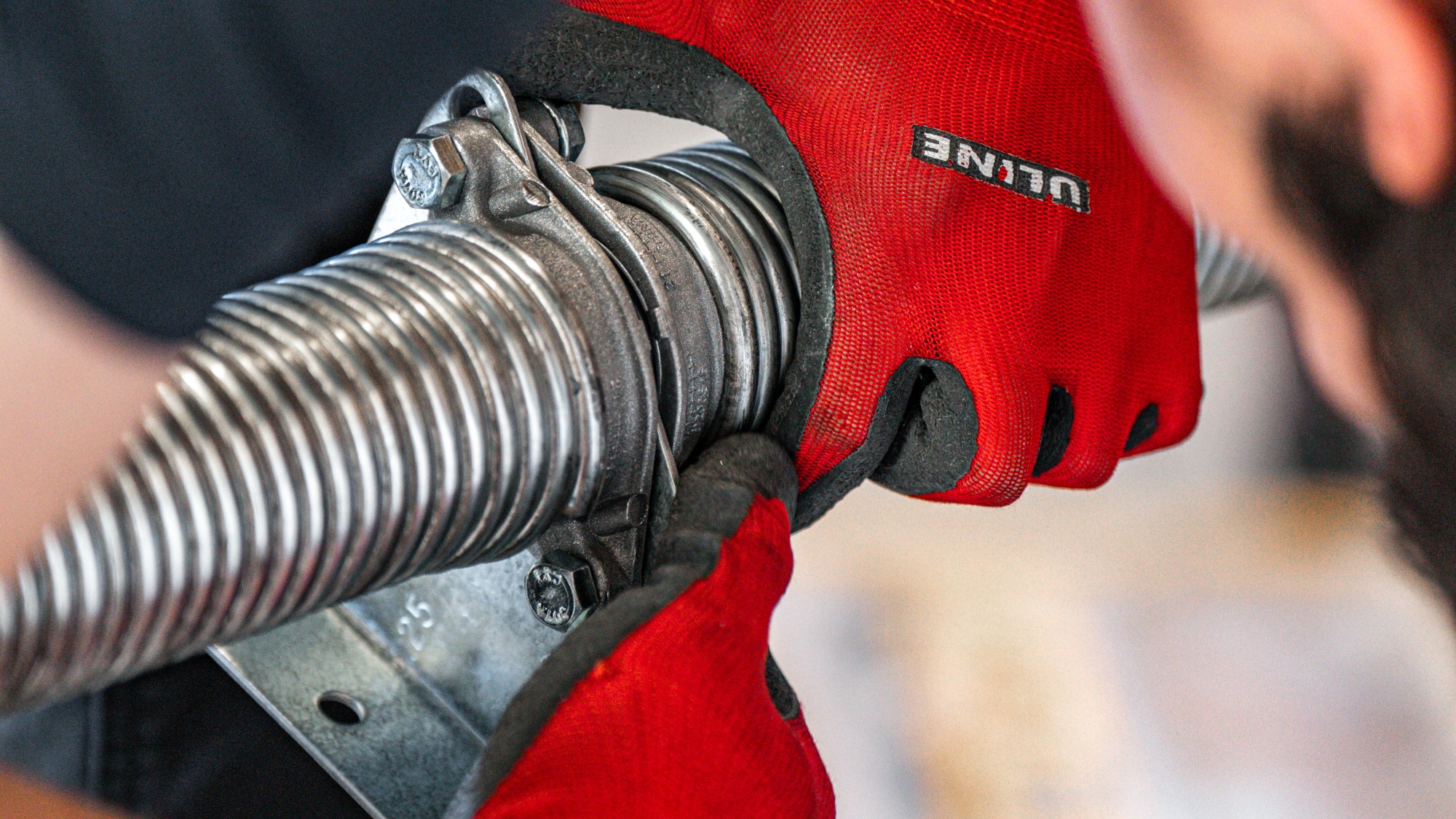 Garage door service provider fixing spring