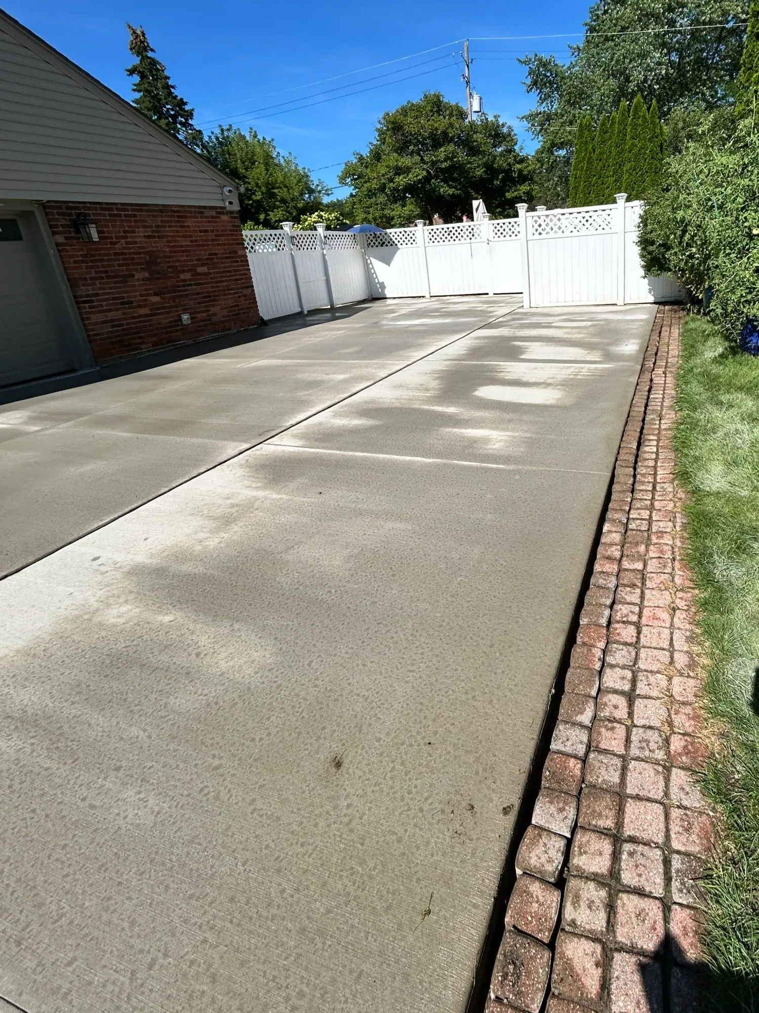 A freshly cured driveway of concrete
